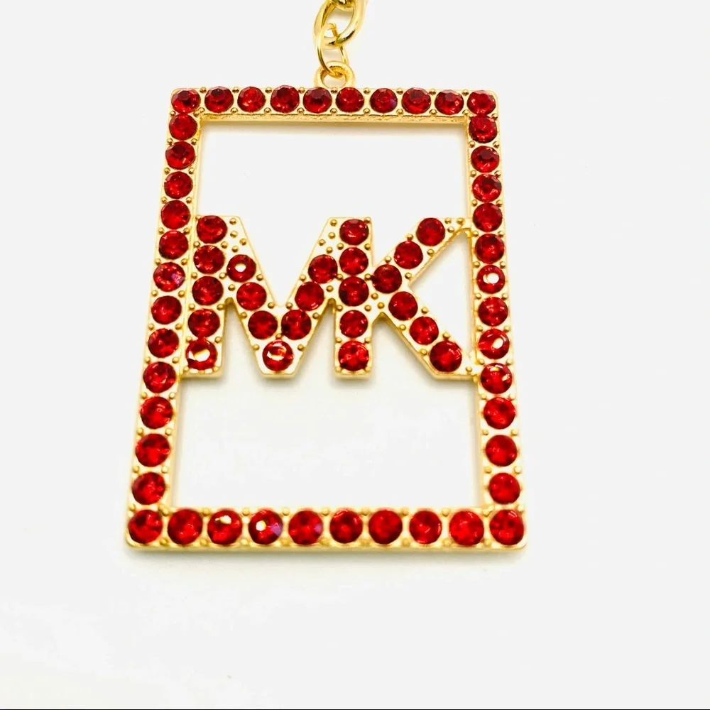 Purse Charm Key Chain MK in Red Crystals set in golden tone.